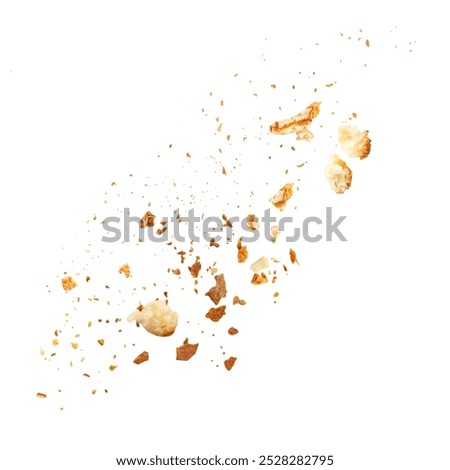 Flying  Bread crumbs macro isolated on white background. Splash of crumbs Top view. Flat lay.