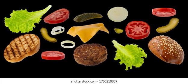 flying Burger ingredients isolated on a black background. set for creating an image with a flying sandwich