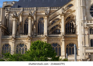 Flying buttresses and stained windows at Saint-Eustache's Church, in Paris, France, a 17th century, Gothic and Renaissance landmark, in Nelson Mandela Gardens, in the Quartier des Halles neighborhood