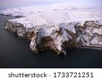 Flying by helicopter over the Wrangel Island, Chukotka