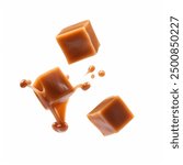 Flying caramel cubes isolated on white background. Floating caramel cubes with melting splash of caramel. isolated on white background. silky melting chocolate caramel.