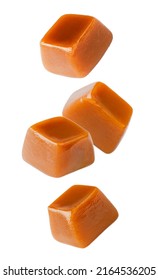 Flying caramel cubes isolated on white background. Set of caramel candies. - Shutterstock ID 2164536205
