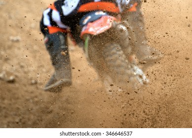 Flying Debris From A Motocross In Dirt Track