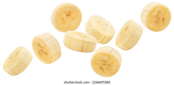 Flying delicious banana slices, isolated on white background
