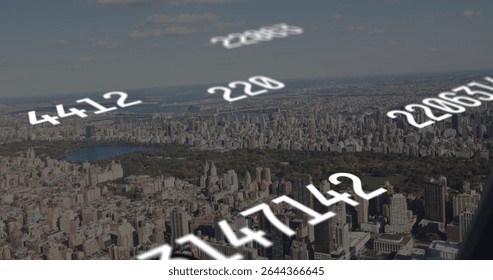 Flying drone capturing tower skyline and green park over city with white floating numeric labels. Skyscrapers, urban, aerial, modern, data visualization, landscape, cityscape - Powered by Shutterstock - Get 15% off with code: PIKWIZARD15