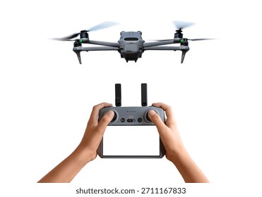 Flying drone and handheld controller on white background, presenting modern aerial technology for photography, mapping, monitoring, and filmmaking
