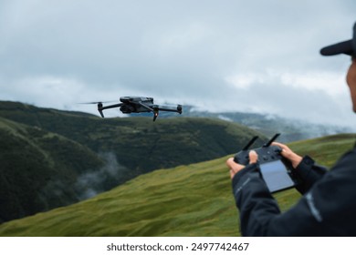 Flying drone in high altitude mountains - Powered by Shutterstock