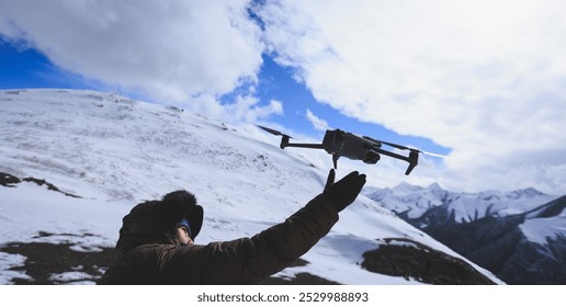 Flying drone in high altitude mountains - Powered by Shutterstock