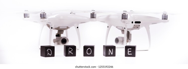 Flying drones on a white background with inscriptions 