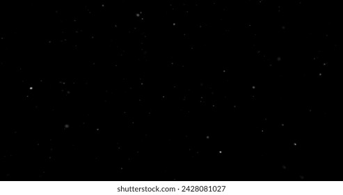 Flying dust particles on a black background - Powered by Shutterstock