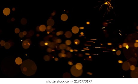 Flying Fire Sparkles. Detail shot, Low Depth of Focus. Filmed on High Speed Cinema Camera, 1000 fps. - Shutterstock ID 2176773177