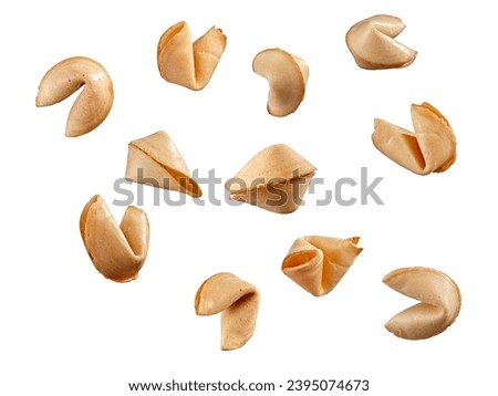 Flying fortune cookies on white background