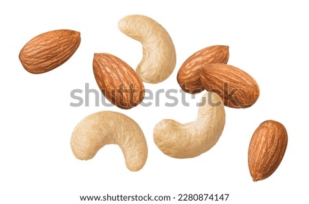 Flying fresh cashew and almond nuts isolated on white background. Top view. Package design elements with clipping path