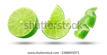 Flying fresh lime slices collection with lemon peel isolated on white background.