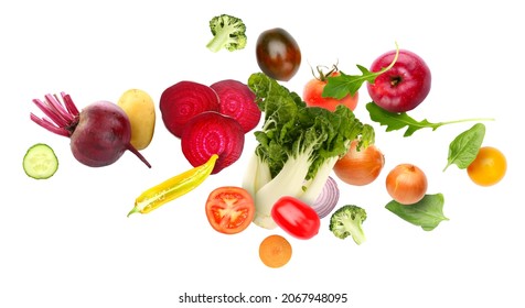 Flying Fresh Vegetables On White Background