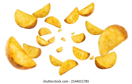 Flying fried potato wedges, isolated on white background