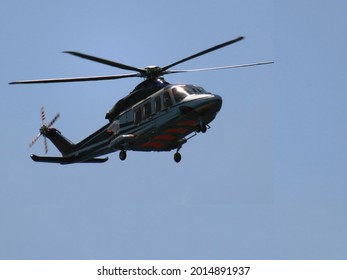 Flying helicopters in the sky. Helicopter for passenger transportation to oil and gas industry.