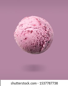 flying ice cream scoop on purple background
