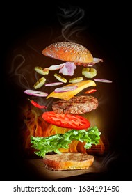 Flying ingredients of beef burger with bacon on a black background
 - Shutterstock ID 1634191450