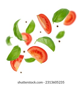 Flying ingredients of tomatoes, basil, pepper on white background. Italian food - Shutterstock ID 2313605235