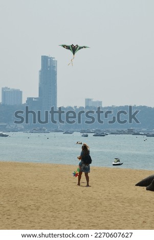 Flying Kite on the beach is an highlight activities during summer.
