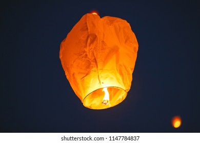Flying Lantern In The Dark Sky
