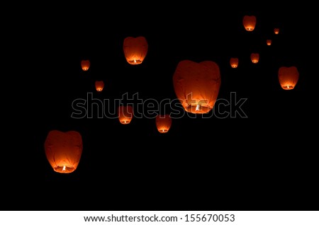 Similar – Image, Stock Photo Illuminated red sky lantern floating in dark night sky