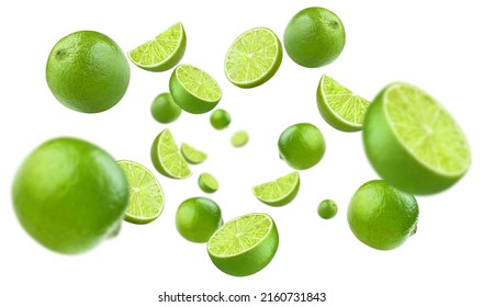 Flying lime fruits, isolated on white background