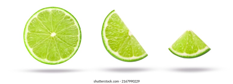 Flying lime slices collection isolated on white background. Clipping path.