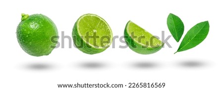 Flying lime with slices and leaf collection isolated on white background.