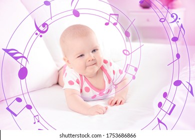 Flying Music Notes And Cute Baby Girl On Bed At Home. Lullaby Songs 