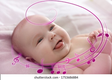 Flying Music Notes And Cute Little Baby Lying On Bed, Closeup. Lullaby Songs 