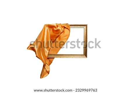 Flying orange satin cloth unveiling golden frame, abstract new product launch backdrop with motion blur