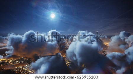 Flying over the deep night timelapse clouds with moon light. Seamlessly looped animation. Flight through moving cloudscape over night city lights. Perfect for cinema, background, digital composition.