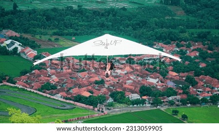 flying photo hanggliding in the outdoor