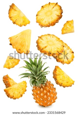 flying pineapple with slices isolated on white background. exotic fruit. clipping path