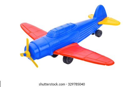 Flying plane toy isolated over white background