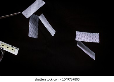 Flying Playing Cards. Black Background