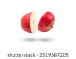 Flying red apple (Envy apple) half slice isolated on white background. Clipping path.