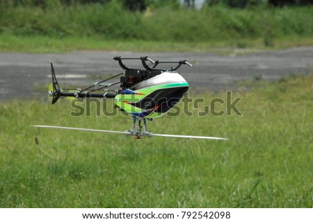 Flying Remote controlled helicopter ,Up side down. RC model hobby