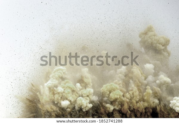 Flying rock and dust storm after detonator blast on the\
construction site 