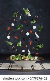 Flying Salad With Black Background