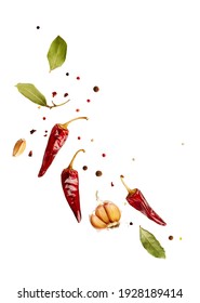 Flying set of colorful spices peppers, chili, garlic, laurel leaf, herbs in the air isolated on white background. Food and cuisine ingredients top view, with copy space.  - Shutterstock ID 1928189414