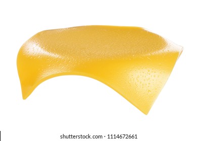Flying slice of cheese for hamburger isolated on white background with clipping path