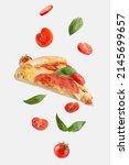 flying slice of margherita pizza with tomatoes and basil