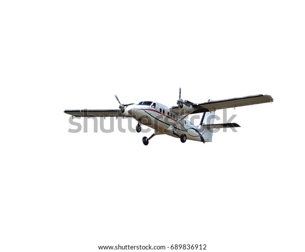 Flying small passenger propeller plane  isolated on\
white background        