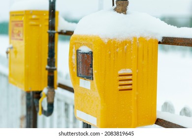 Flying Snowflakes And A Gas Meter On A Pipeline, Cold Winter Day Outdoor Shot