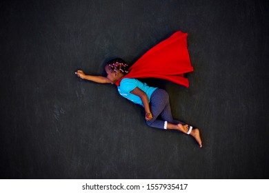 Flying Super Hero Girl With Red Cape