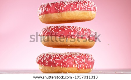 Similar – Pink donuts Food Roll