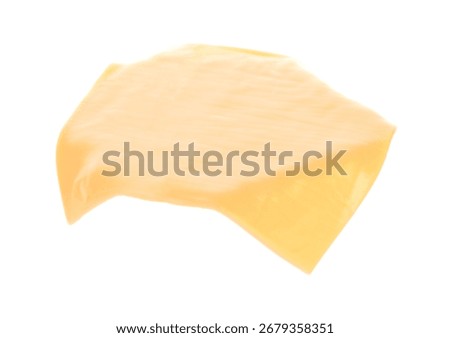 Flying thin cheese slice for cheeseburger, isolated on a transparent background. Tasty food ingredient for burger, sandwich, cooking, and design